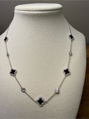 Silver Necklace with Black Clover Motifs and Clear Stones